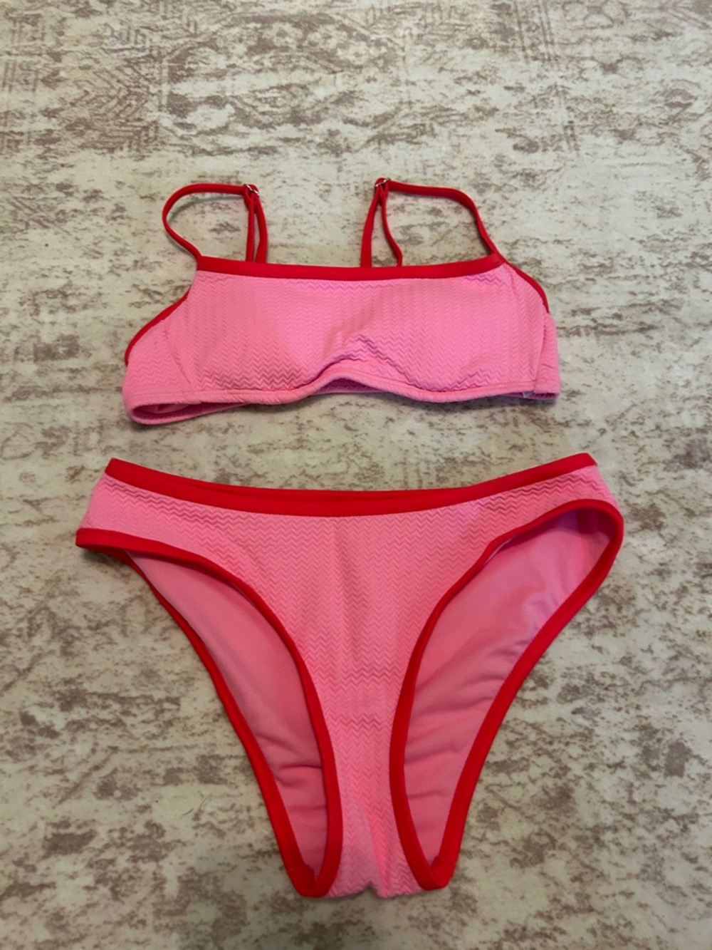 Pink Two-Piece Bikini with Red Trim